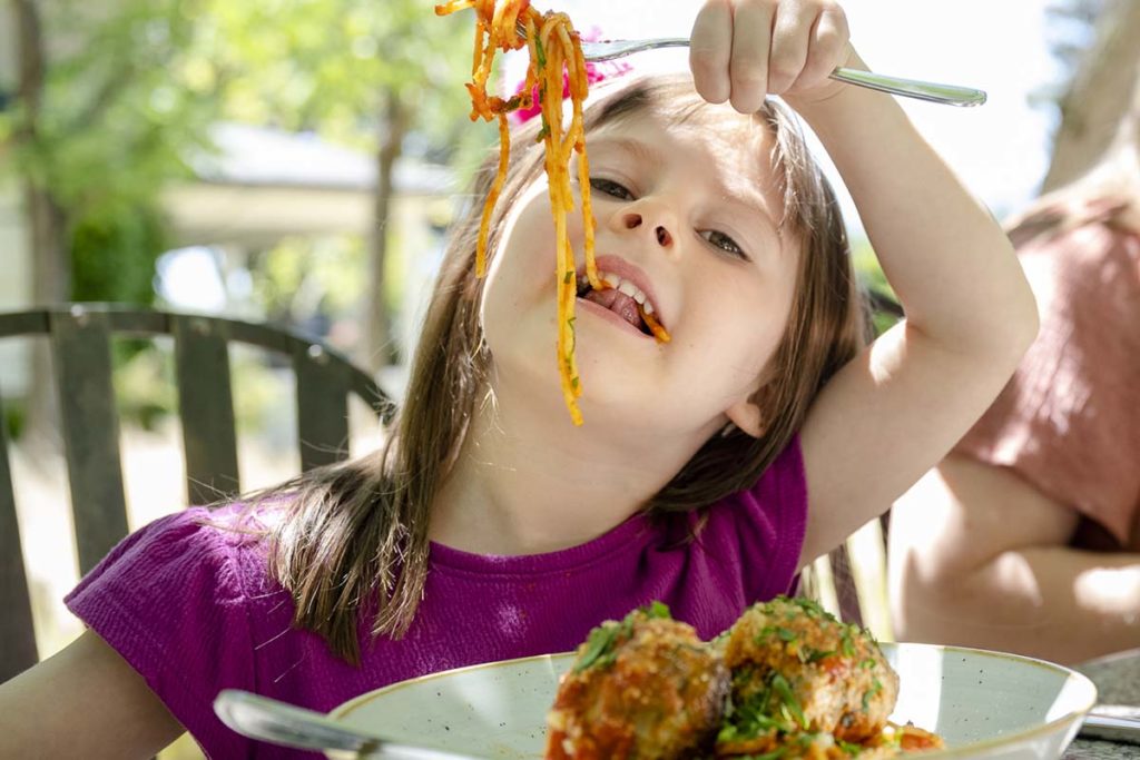 Girl Eating Spaghetti